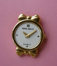 PIN'S DOUBLE MOULE MONTRE DE