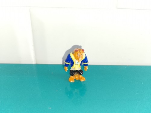 Polly pocket figurine doll