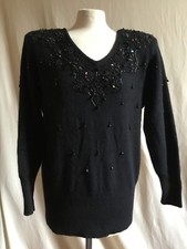 Pull 90 % laine d’agneau + angora VANGO noir  taille L plutôt 38/40 comme neuf.