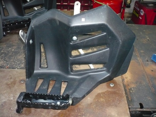Marche pied mud - guard, gauche