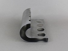 Brushed steel pipe holder