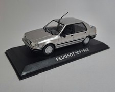 Peugeot 309 gris 1988 1/43 IXO
