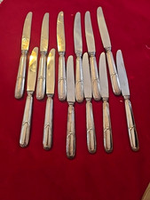 12 COUTEAUX en Métal Argenté