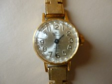 Ancienne  montre femme mécanique plaqué or YONGER  BRESSON  bracelet à fermoir