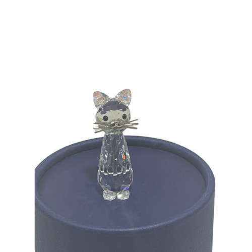 Swarovski cat figurine damage - figurine,