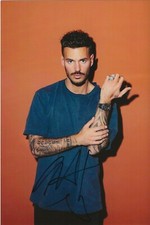 Autographe sur photo : M Pokora ( 19 x 12,5 )