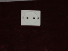 Un Socle de Prise deux pôles