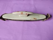 ancien polissoir à ongles en bakélite