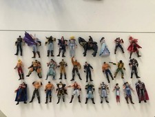 Lot 28 figurines ken le