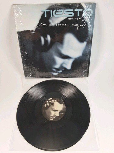 Tiesto love comes again - -,
