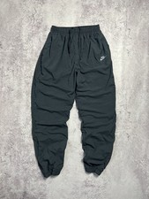 Pantalon de survêtement vintage Nike en nylon pour homme noir doublé ourlet...
