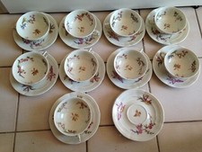9 TASSES ET 12 SOUCOUPES EN PORCELAINE DE LIMOGEs BERNARDEAU cambet lyon