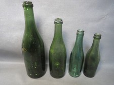 Lot 4 anciennes bouteilles de