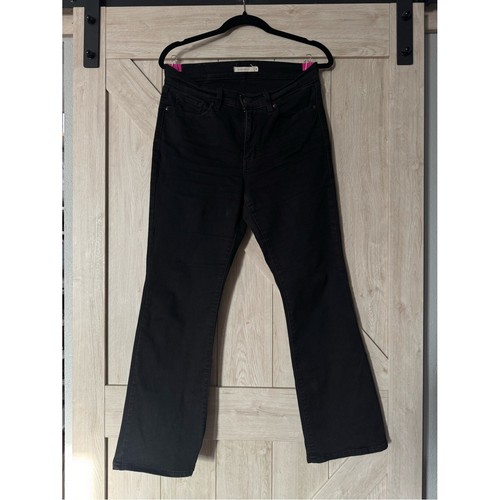 Black mid rise boot - cut, jeans