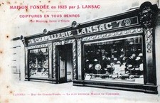 CPA 65 TARBES RUES DES GRANDS FOSSES COMMERCE J.LANSAC COIFFURES EN TOUS GENRES