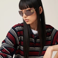 Lunettes de soleil Miu Miu femme – modèle oversize sans monture dorée – logo dor