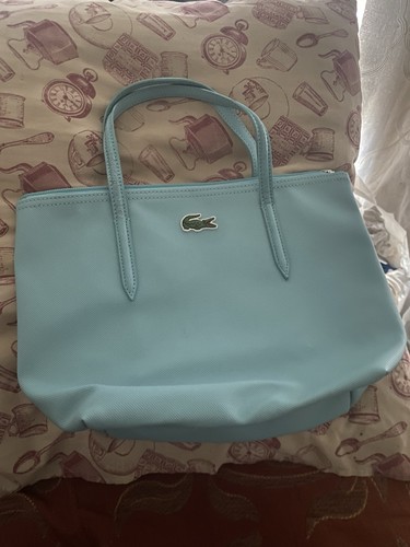 Lacoste sac porté épaule