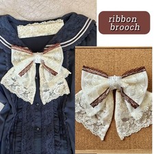 Collier pendentif broche ruban