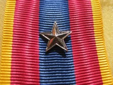 Agrafe Etoile Argent  pour citation Médaille Défense Nationale