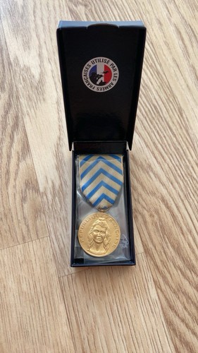 Médaille titre - titre, de