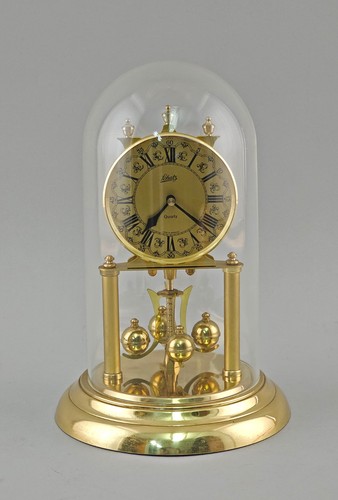 Horloge pendule rotative en - À,