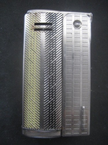Ancien briquet essence - À,