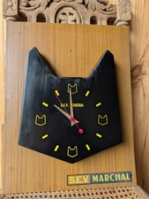 Horloge publicitaire tête de