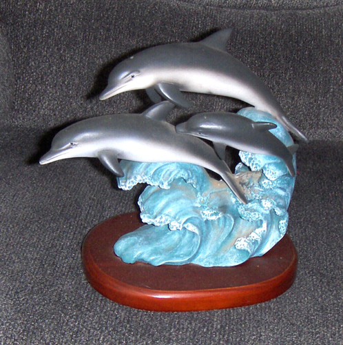 Pod dolphins on surf - dolphins,
