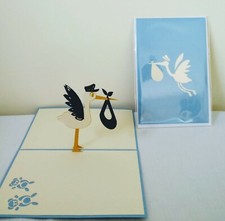 Cigogne livre bébé en écharpe bleue 3D Kirigami carte de voeux pop-up
