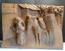 BAS RELIEF TERRE CUITE UN ANGE CONDUISANT UN ANE POUR DECOR CRECHE DE NOEL