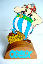 OBÉLIX  TIRELIRE VILAC BOIS  GOSCINNY-UDERZO  1995   Ht20 cm  BON ÉTAT