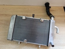 UN RADIATEUR ORIGINE SCOOTER