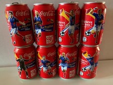 LOT 8 CANETTES COCA COLA WORLD