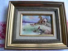 peinture sur porcelaine signé