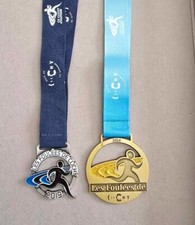 Lot médaille finisher Les
