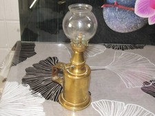 Ancienne Lampe "Pigeon"  garantie véritable en laiton, essence minérale. Vintage