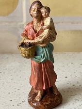 santon devineau creche noel bergere portant un enfant et un panier