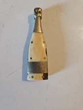 couteau de poche forme bouteille coupe muselet Moigneaux champagne