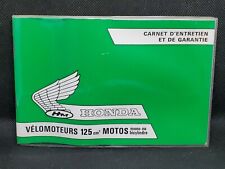 Ancien carnet d'entretien et de garantie vélomoteur moto Honda 125 cm3 années 70