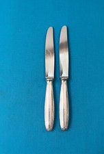 1 grand couteau CHRISTOFLE modèle RUBANS CROISÉS métal argenté 24,5 cm couvert