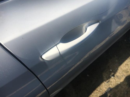 Poignee porte avant droit
