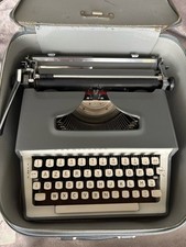Ancienne machine à écrire REMINGTON MONARCH+valise De Transport + Notice