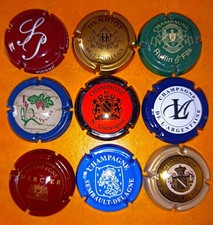 DA5) Un lot de 9 capsules de