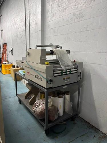 Roll laminator and cutter gbc - and,