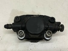 UN ETRIER DE FREIN AVANT