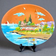 Assiette en terre cuite peinte