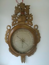 Baromètre en bois sculpté