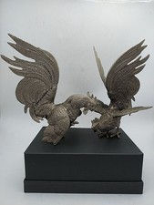 Coqs de combat en métal