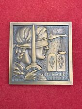 Médaille carrée en bronze