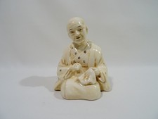 ANTIQUE FAIENCE FIGURINE